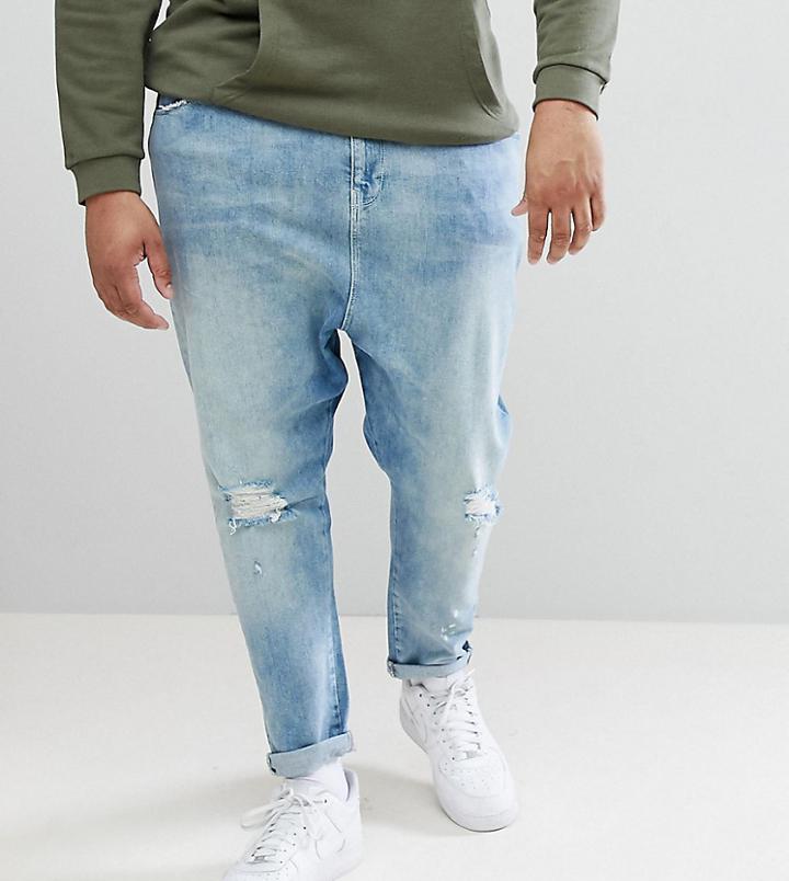 Asos Design Plus Drop Crotch Jeans In Mid Wash Blue With Rips - Blue