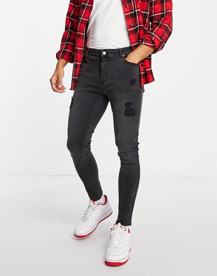 Asos Design Spray On Jeans With Power Stretch In Washed Black With Abrasions