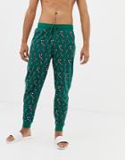 Asos Design Holidays Lounge Joggers In Candy Cane Print - Green