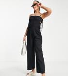 Asos Design Tall Shirred Strappy Jumpsuit With Tie Side Detail In Black