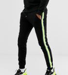 Asos Design Tall Skinny Joggers With Neon Side Stripe Taping In Black - Black