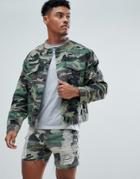 Siksilk Collarless Muscle Denim Jacket In Camo With Distressing - Green