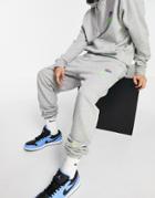 Nike Essential Fleece+ Multi Logo Casual Fit Cuffed Sweatpants In Gray-grey