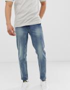 Asos Design Recycled Tapered Jeans In Mid Wash - Blue