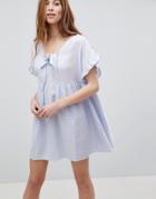 Asos Casual Mini Smock Dress In Grid Texture With Bunny Tie - Blue