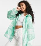 Asos Design Petite Printed Rain Jacket In Green