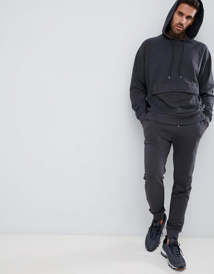 Asos Design Tracksuit Oversized Hoodie/super Skinny Joggers In Washed Black - Black