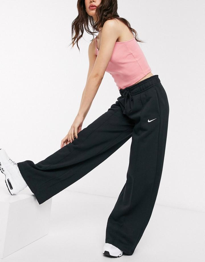 Nike Mini Swoosh High Waisted Wide Leg Joggers In Black
