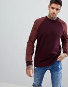 Asos Design Sweatshirt In Burgundy With Interest Fabric Raglan Sleeves - Red