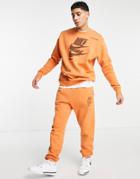 Nike Sport Essentials Multi Futura Logo Fleece Sweatpants In Orange