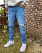 Asos Design Classic Rigid Jeans In Mid Wash Blue With Rips-blues