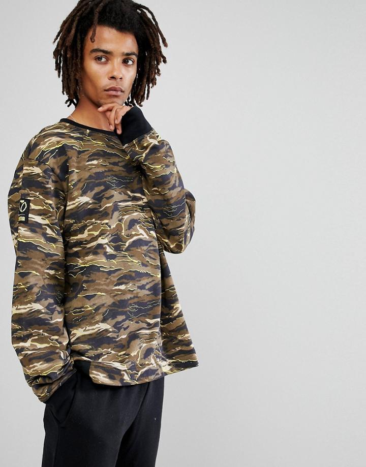 Puma X Xo Oversized Crew Neck Sweatshirt In Camo 57534751 - Green