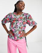 Twisted Wunder Puff Sleeve Blouse In Black Base Painted Floral-multi