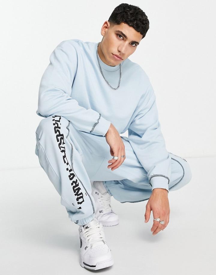 Asos Unrvlld Spply Oversized Sweatpants With Logo Print & Front Seams In Light Blue-blues