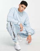Asos Unrvlld Spply Oversized Sweatpants With Logo Print & Front Seams In Light Blue-blues