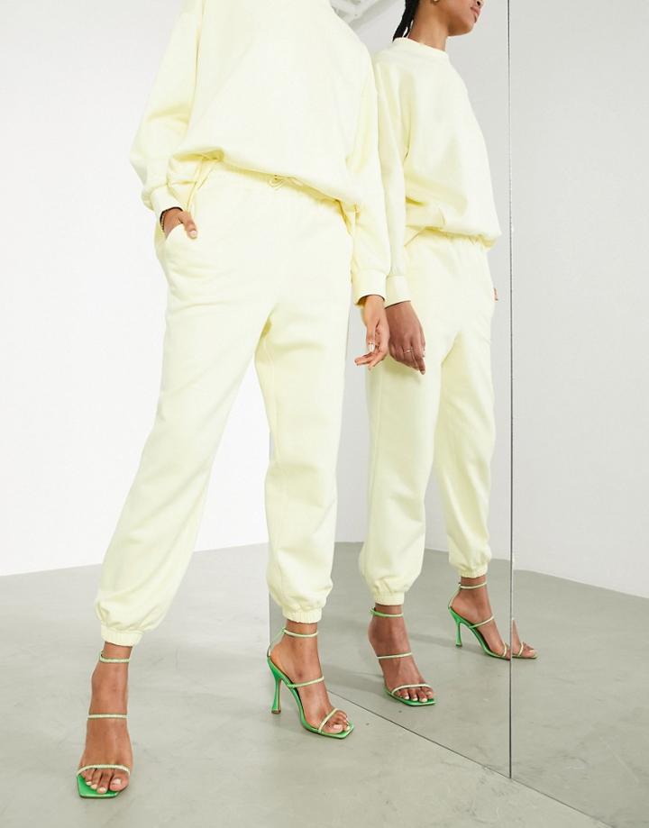 Asos Edition Cuffed Sweatpants In Pale Yellow