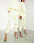 Asos Edition Cuffed Sweatpants In Pale Yellow