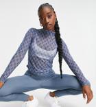 Puma Infuse Sheer Repeat Logo Long Sleeve Top In Petrol Blue-blues