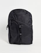 Consigned Diagonal Zip Backpack In Black