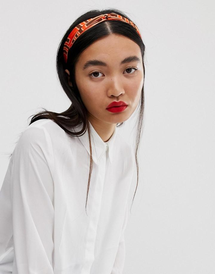 Asos Design Headband With Twist Front In Geo Monogram Print In Orange - Orange