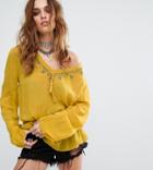 Sacred Hawk Festival Relaxed Blouse With Delicate Beading And Tassel Trim - Yellow