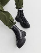 Asos Design Lace Up Boots In Black Faux Leather With Contrast Stitch Detail