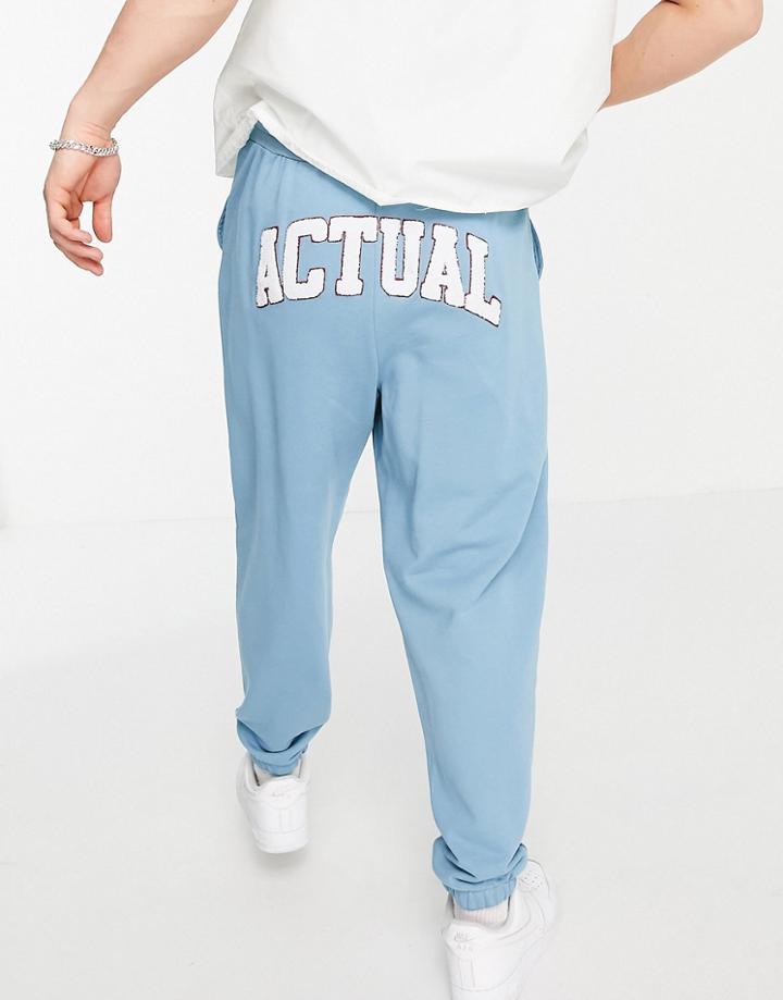 Asos Actual Set Relaxed Sweatpants In Blue With Applique Logo-blues