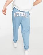 Asos Actual Set Relaxed Sweatpants In Blue With Applique Logo-blues