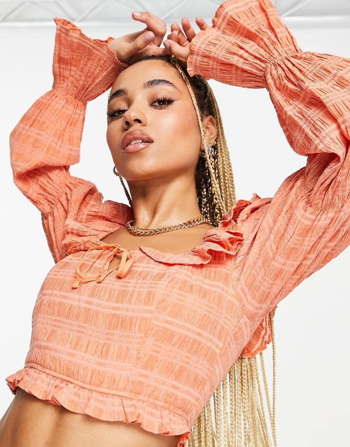 Asos Design Shirred Crop Top With Ruffle Detail And Volume Sleeve In Rust-orange