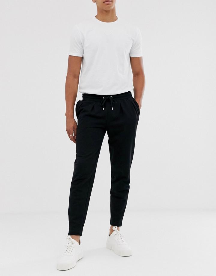 Asos Design Tapered Sweatpants With Pleats In Black - Black