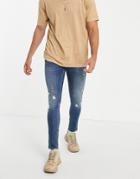 Asos Design Cotton Blend Skinny Jeans In Tinted Dark Wash With Rips And Turn Up - Mblue-blues