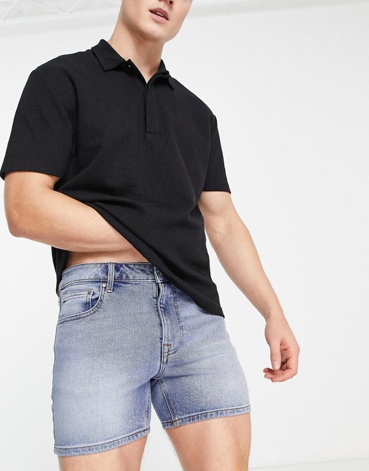 Asos Design Shorter Length Skinny Denim Shorts In Mid Blue Wash