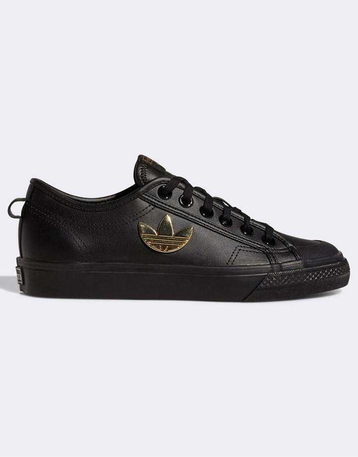 Adidas Originals Nizza Sneakers In Black With Gold Logo