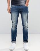Wrangler Skinny Low Rise Jean In Distant Relation Wash - Blue
