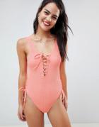 Asos Design Lace Up Front Crinkle Swimsuit In Pastel Orange - Orange