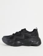 Truffle Collection Chunky Bubble Sole Sneakers In Black