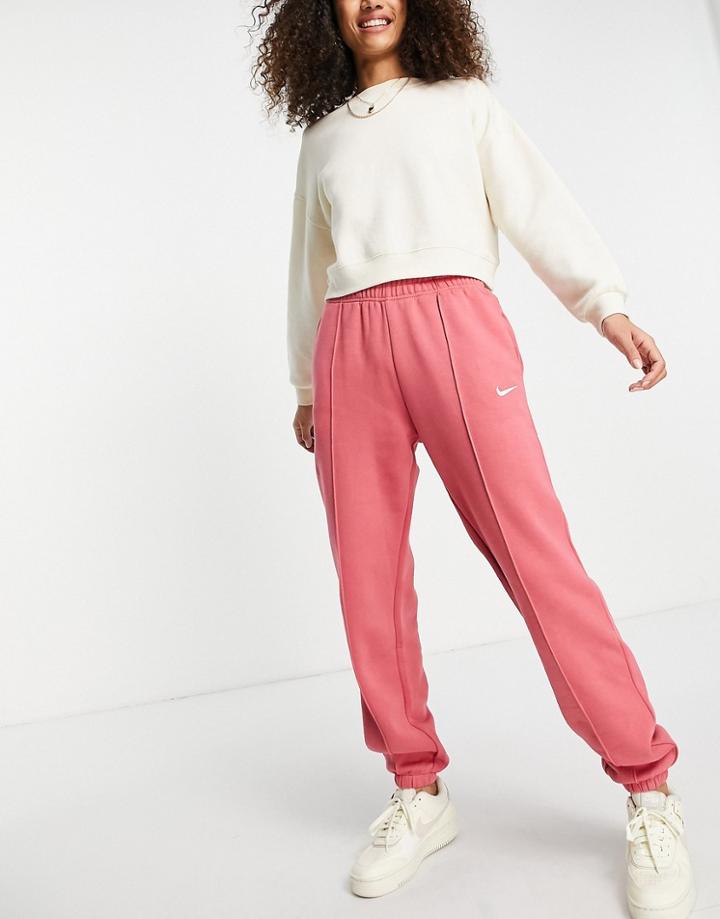 Nike Collection Fleece Loose-fit Cuffed Sweatpants In Dusty Red