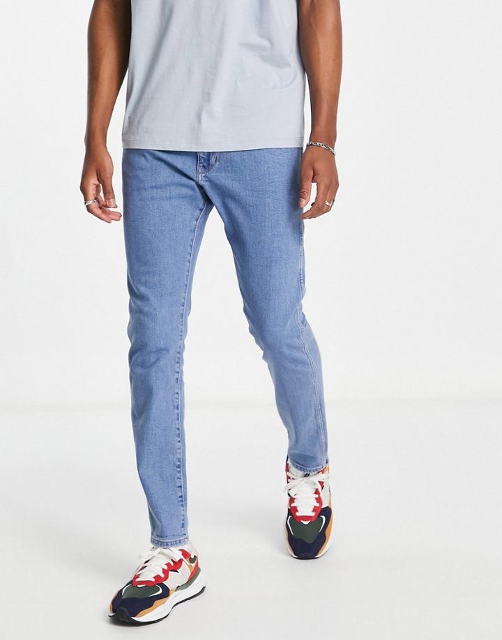 Wrangler Bryson Skinny Jeans In Mid Blue