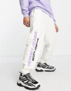 Tommy Jeans Global Unites Logo Cuffed Sweatpants In Off White
