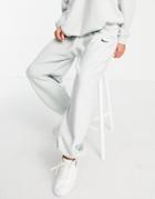 Nike Essentials Plush High-waisted Cuffed Fleece Sweatpants In Gray-grey