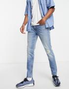 Asos Design Cone Mill Denim Skinny Fit American Classic Jeans In 90s Mid Wash With Abrasions-blue