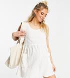Asos Design Maternity Smock Sleeveless Textured Romper With Pockets In Cream-white