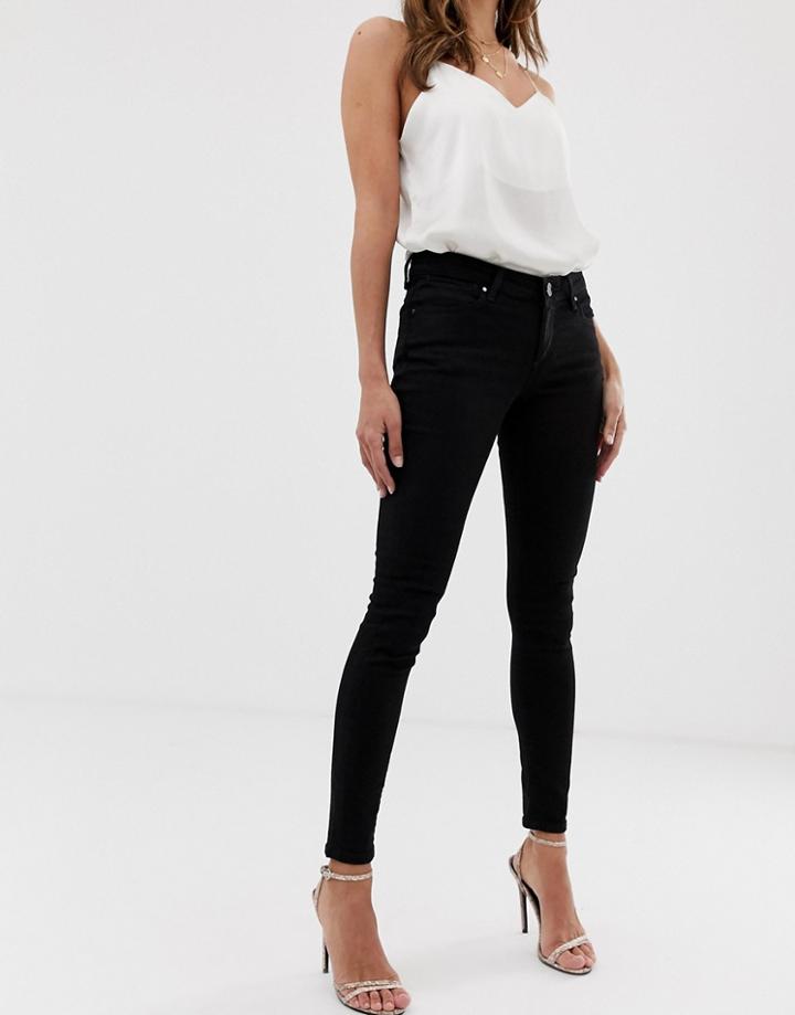 Asos Design Whitby Low Rise Skinny Jeans In Clean Black-blue