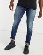 Asos Design Skinny Jean In Dark Blue Vintage Japanese Wash With Abrasions