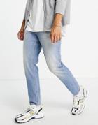 Asos Design Tapered Jeans In Light Wash With Abrasions - Lblue-blues