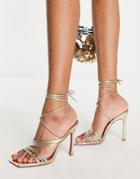 Asos Design Nest Strappy Tie Leg Heeled Sandals In Gold