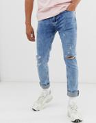 Asos Design Skinny Jeans In Washed Blue With Knee Rips