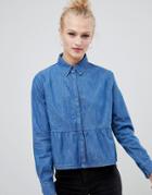 Asos Design Denim Shirt With Ruffle Hem In Midwash Blue - Blue