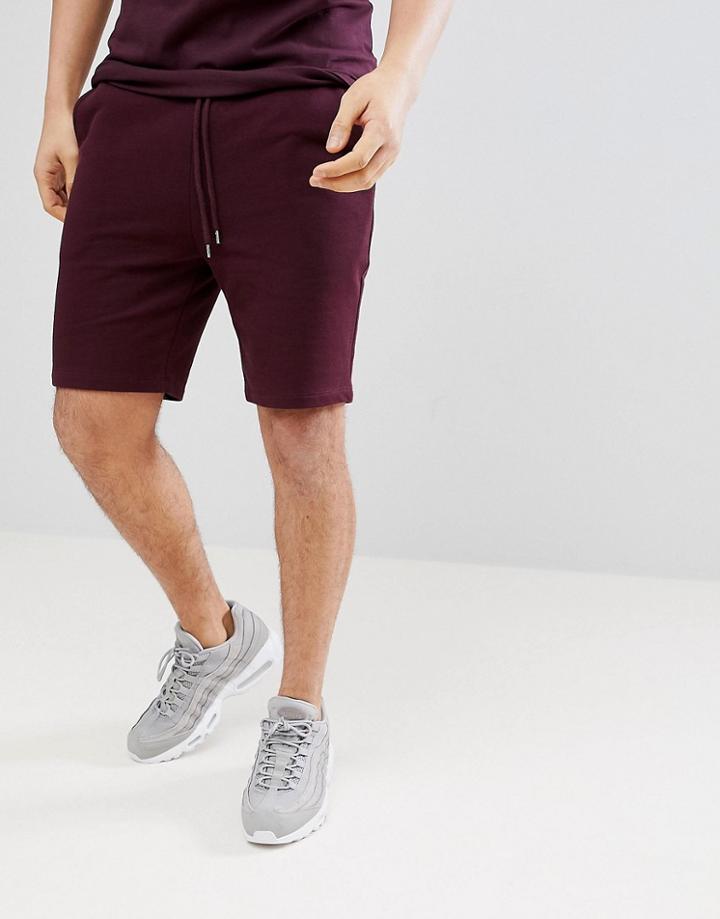 Asos Design Jersey Skinny Shorts In Burgundy With Fabric Interest Pocket - Red