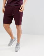 Asos Design Jersey Skinny Shorts In Burgundy With Fabric Interest Pocket - Red